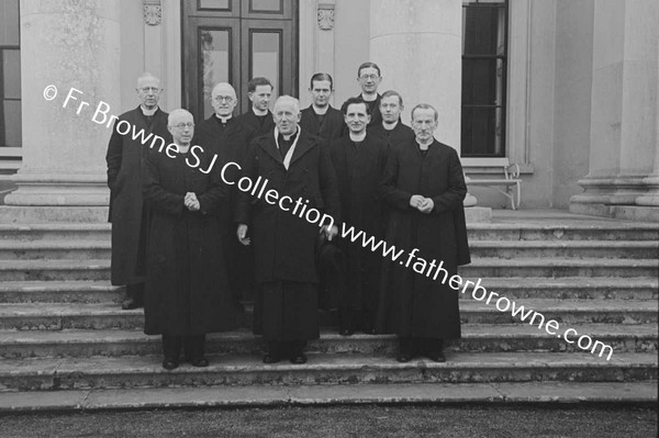 V.REV.J.HANNON WITH COM. FRONT;O'MAHONY(RECT),J.HANNON,S.BARTLEY,BACK;F.M.B.,CUFFE,BRENNAN,PRENDERGAST,BYRNE,MAGUIRE,HOGAN